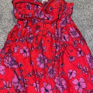 Cute mini red dress with pink flowers.